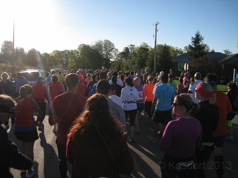 2013 Bayshore Half 050.JPG - Finally, it is announced that runners should head to the start line. Get those frozen joints moving a little bit.